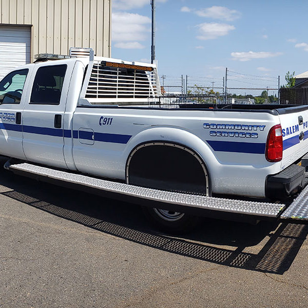 Custom metal fabrication of police transport vehicle