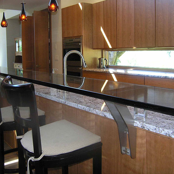 Custom residential metal fabrication in Salem, Oregon utilizing laser cutting, CNC forming, and welding