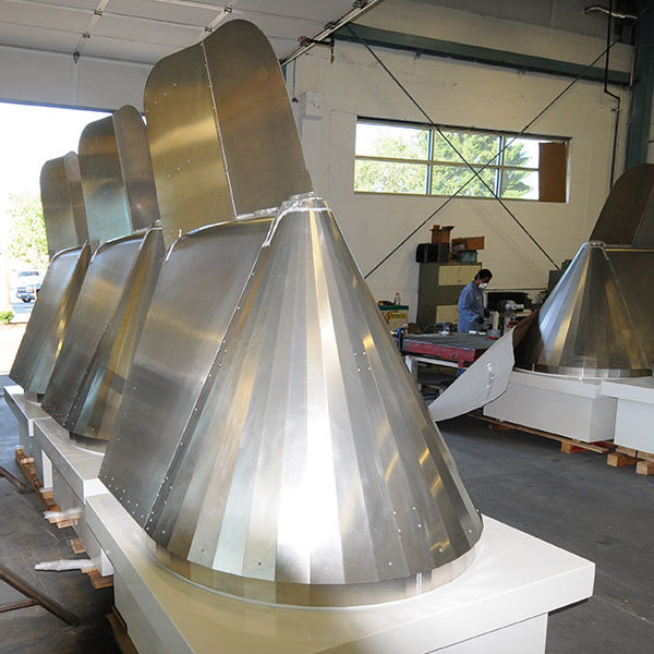 Custom sheet metal fabrication in Salem, Oregon utilizing laser cutting, CNC forming, and welding